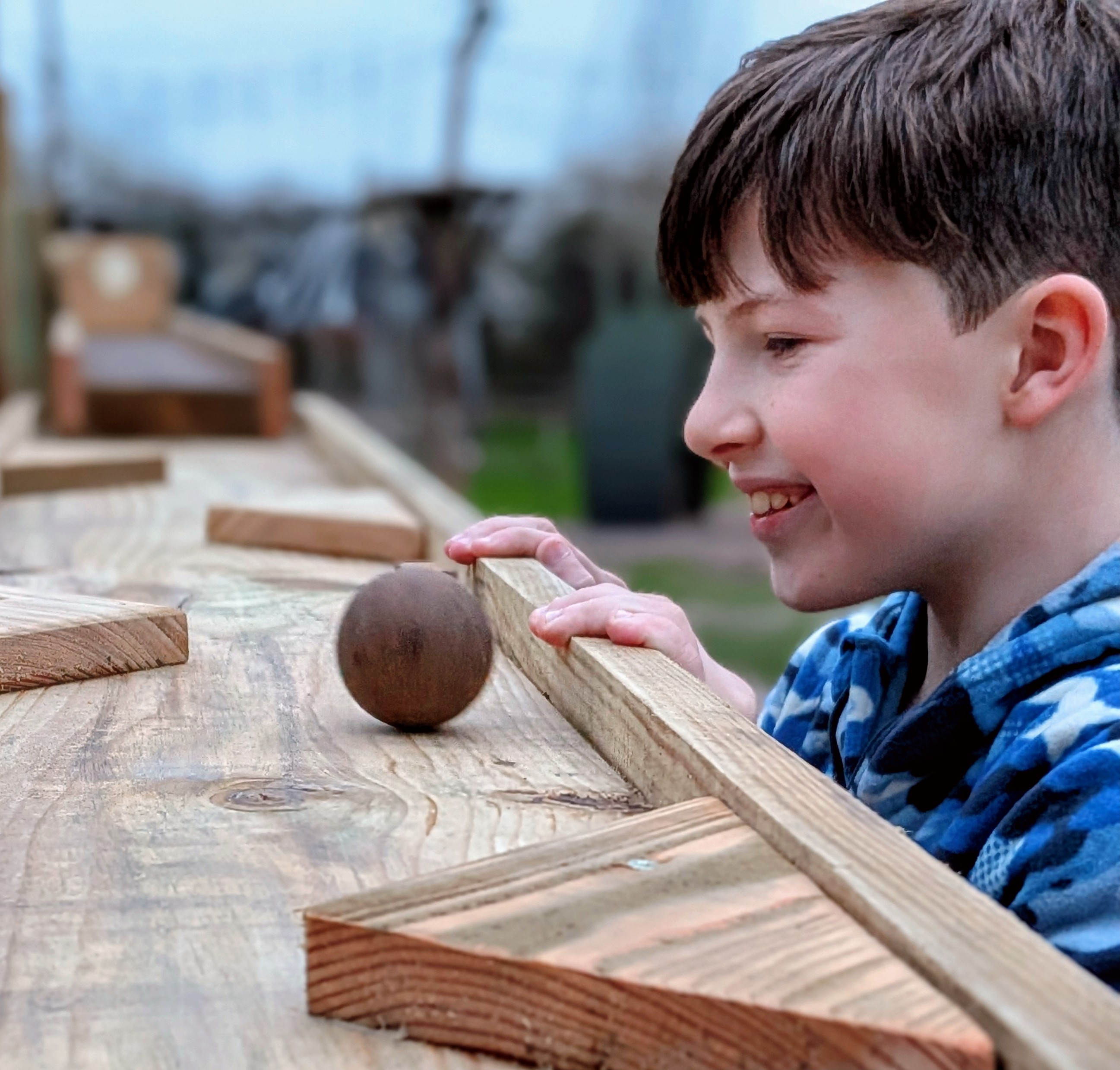 child enjoying marbles runs at Hobbledown Epsom